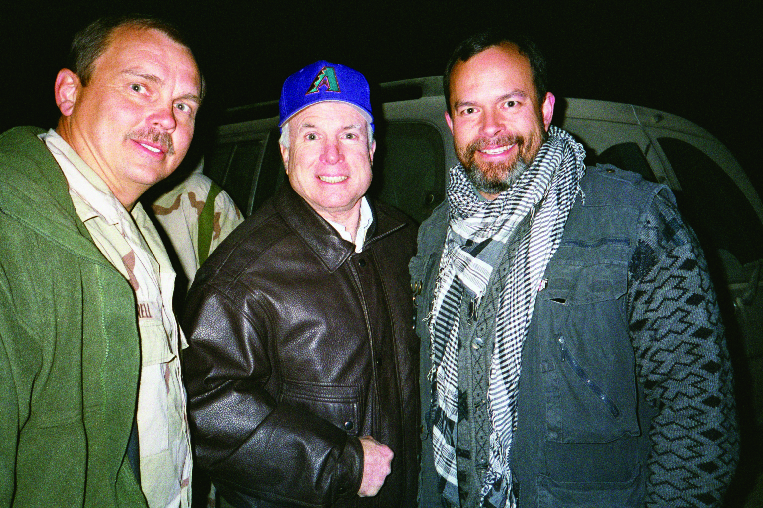 Lieutenant Colonel C. John Taylor (right) was the
        first member of the Corps to set foot on Afghan
        soil. In this photograph, taken in Afghanistan on 7
        January 2002, Taylor is joined by Brigadier General
        Gary Harrell (left) and Senator John McCain (middle).
        (Photo courtesy of author)